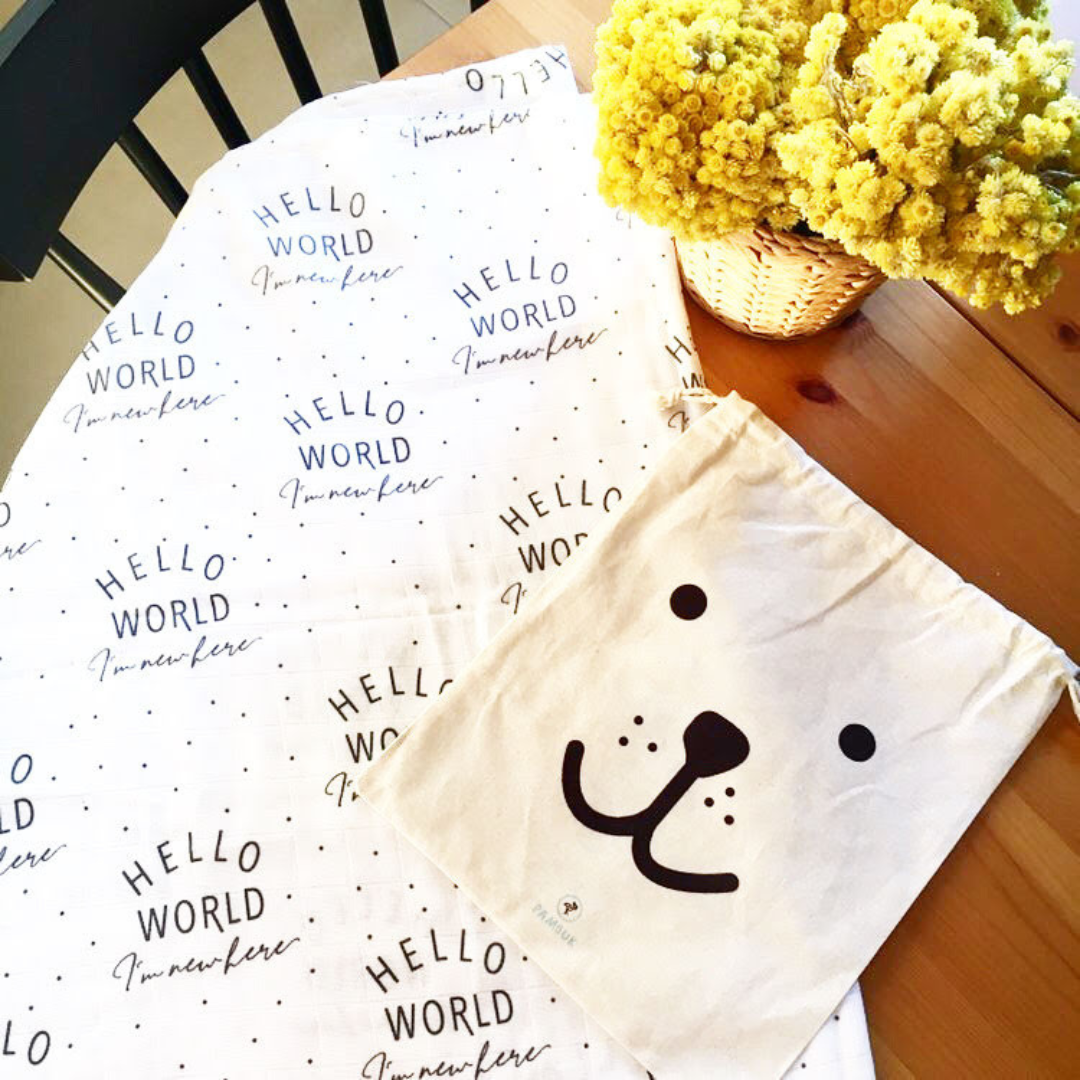Hello World Muslin Swaddle – Signature Organic Baby Blanket | Softness Begins Here
