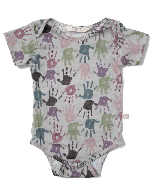 Organic Cotton Onesie – “HANDPRINTS” Design by Adrian Laine (Age 5)